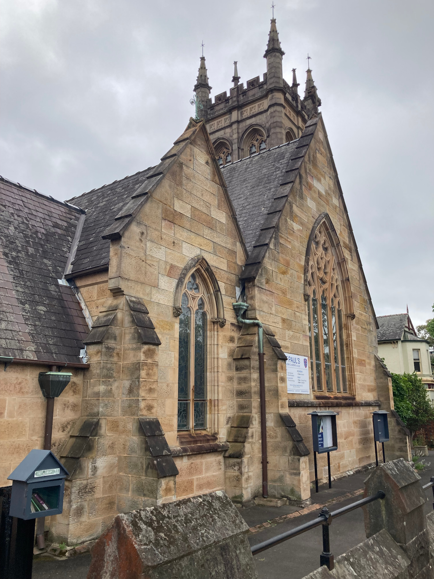 Sandstone facade and bell tower of St Paul's Anglican Church, Burwood